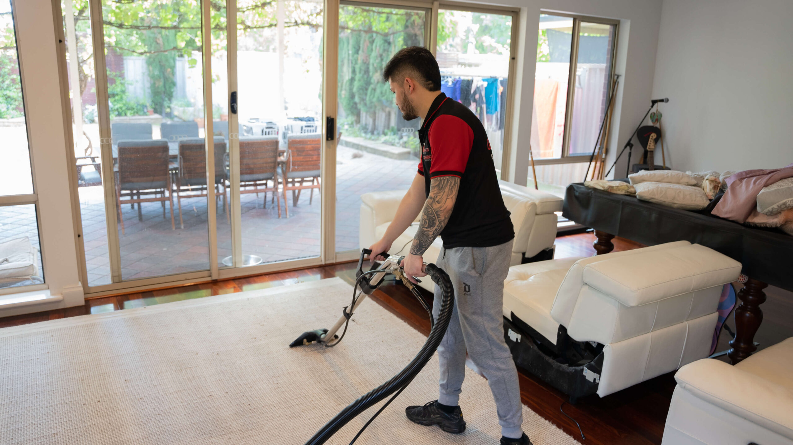 Advanced Home Services Staff Vacuuming